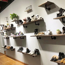 Childrens shoe store wall-mounted upper wall shoe rack display rack mens and womens shoe stores sell shoes on the shelf Shoe store decoration renderings