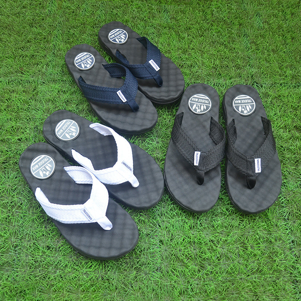 Flip-flops men's tide rubber men's summer fashion wear massage clip-on personality Korean canvas belt non-slip beach sandals and slippers
