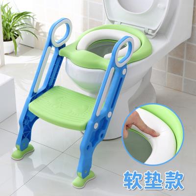 The steps of the chair toilet are used to clean the boys. The baby girl is cute and the toilet holder covers the ladder.