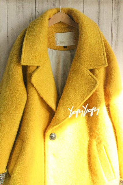 ຕົ້ນສະບັບ turmeric wool woolen coat mid-length coat large lapel suit collar fake two-piece silhouette cocoon splicing