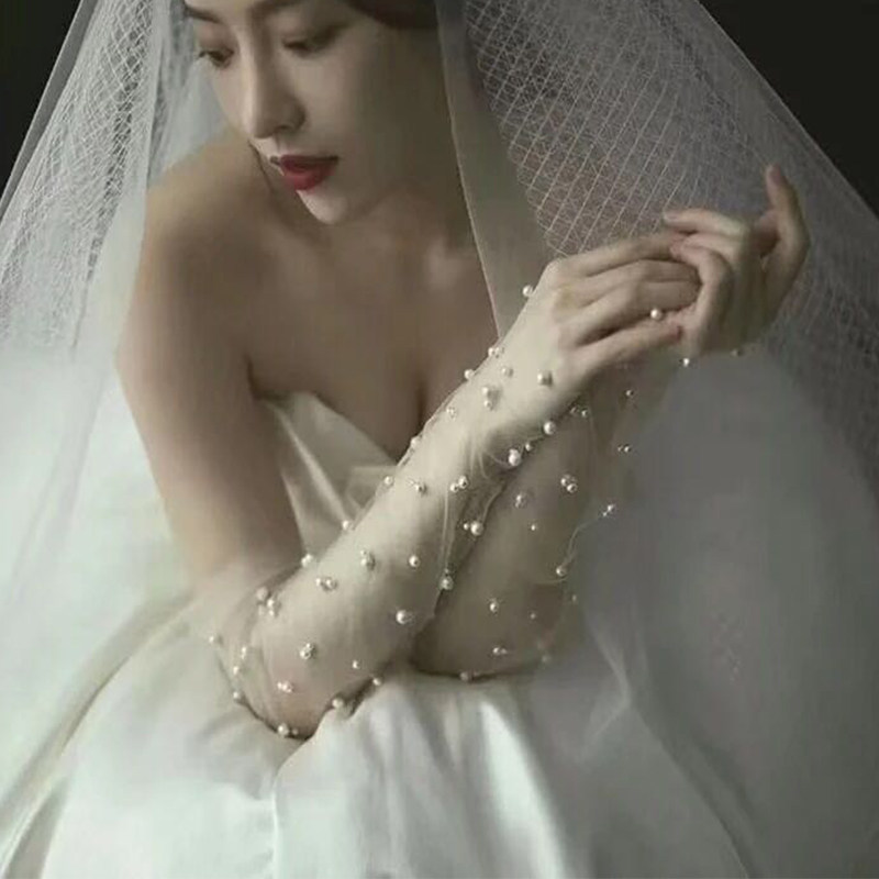 Bridal gloves 2020 new wedding beaded white net red photo gloves travel shooting shadow mesh wedding dress long version