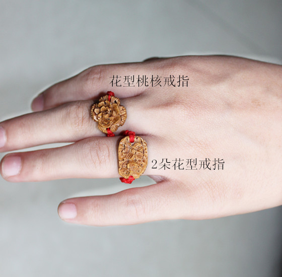 Red rope peach core flower ring Peach core carving wood carving ring Peach core ring unit price