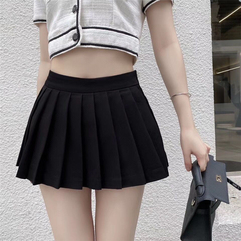 Pleated short skirt women's 2021 summer new wild college wind anti-go light high-waisted A-word puffy thin skirt