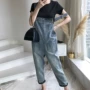 2018 phiên bản Hàn Quốc mới của size lớn chất béo mm chín điểm denim overalls nữ mùa thu eo cao retro jumpsuit giảm béo quần jean rách nữ