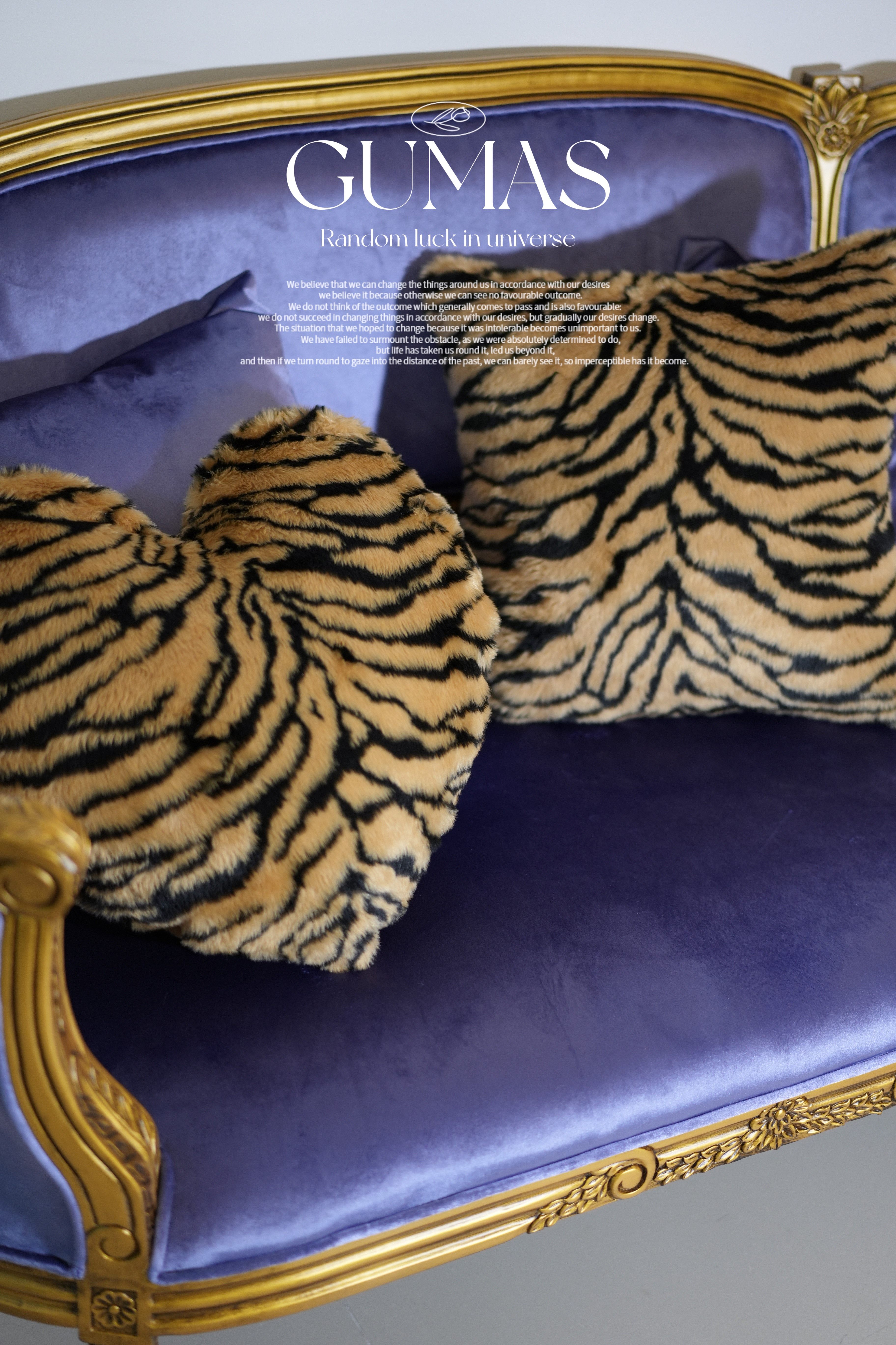 Close-up of tiger stripe plush velvet texture showing furry pile detail in gold and black