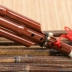 Senque đích thực nhạc cụ nhạc cụ chuyên nghiệp ABS giả gỗ hạt điều chỉnh âm thanh cucurbit nhạc cụ lụa người mới bắt đầu thả b gửi hộp - Nhạc cụ dân tộc
