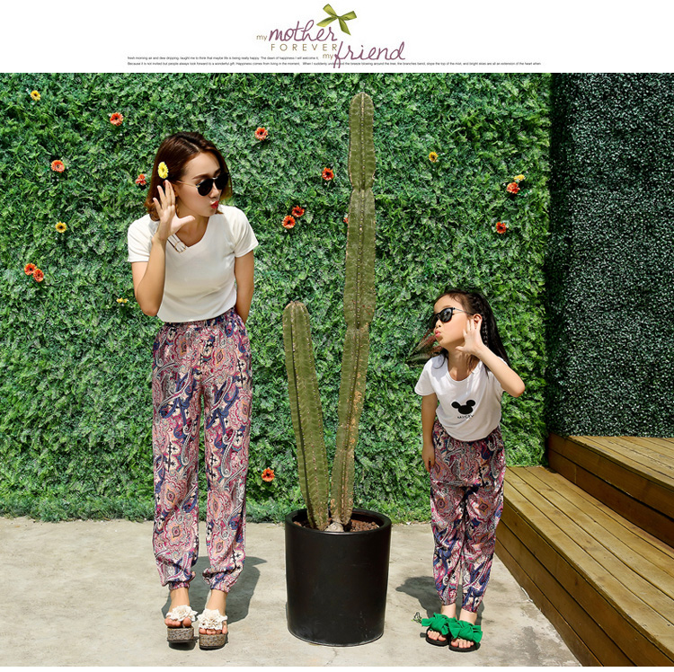Mẹ mùa hè váy cha mẹ và con nạp bông lụa quần bãi biển nhân tạo cotton silk cây ra hoa Thái in cao eo nữ quần váy đầm tuổi trung niên