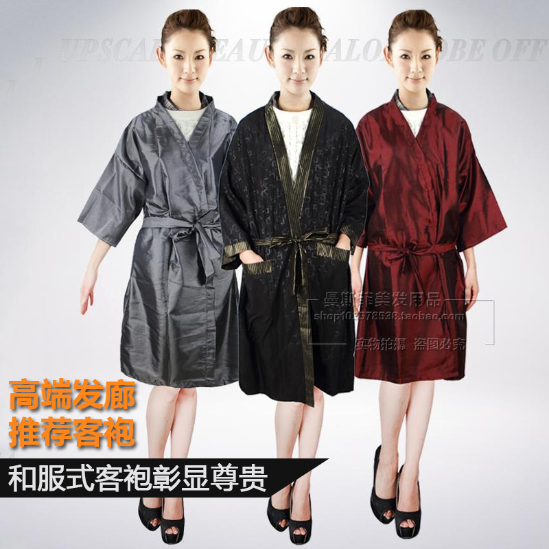 Upscale beauty and hairdresser customer service customer gown bronzed and oiled hair and hair salon special cut and haircut fabric non-stick hair work