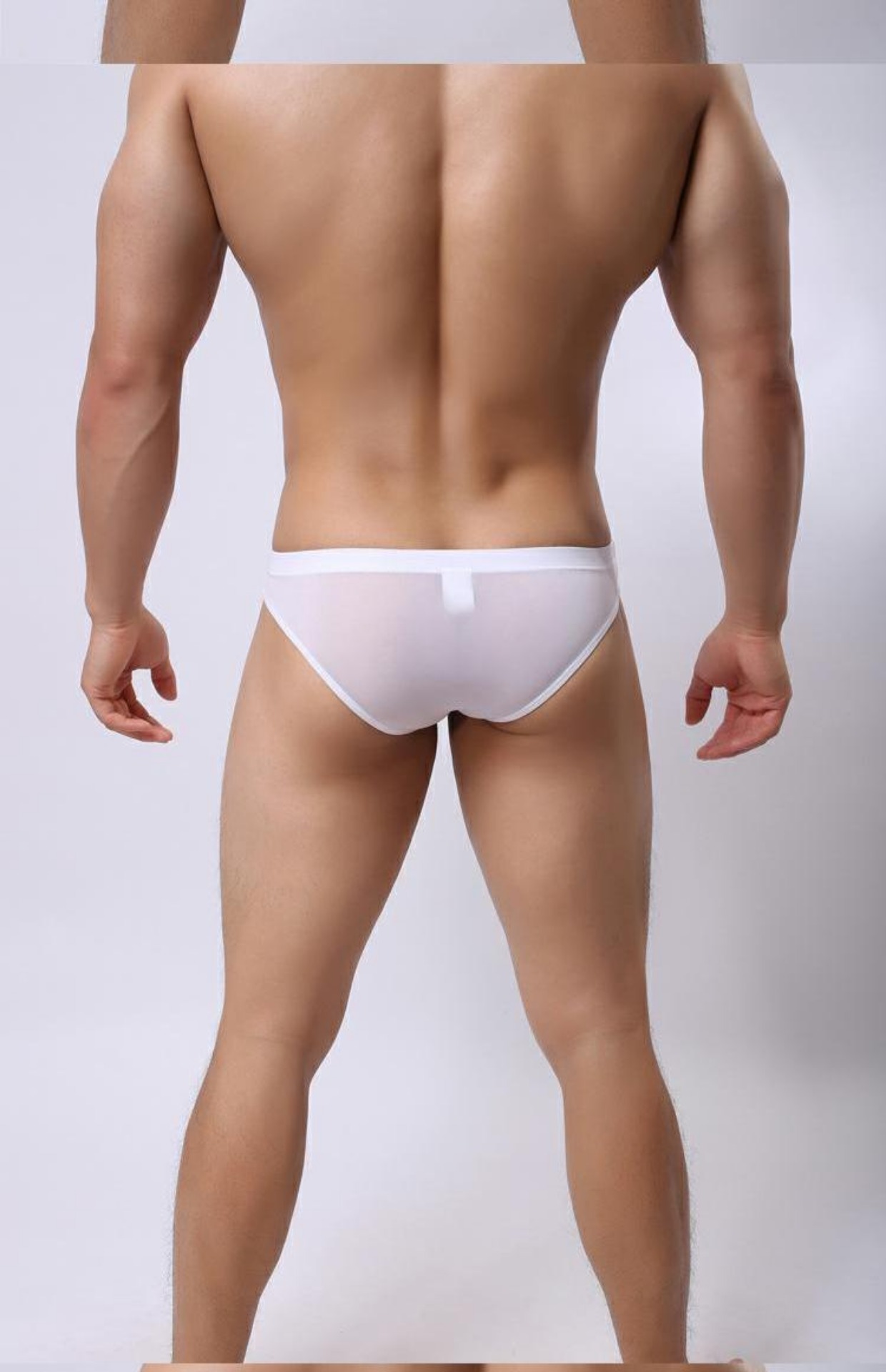 Làn sóng nam mới băng mượt eo thấp mở lỗ cám dỗ rỗng gợi cảm vi mô thanh niên tam giác thong đồ lót đồ lót nam