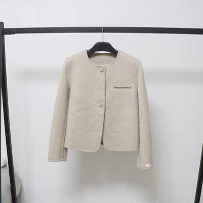 This double-sided wool coat is a stylish, round-neck, button-down, short, petite, and versatile woolen coat