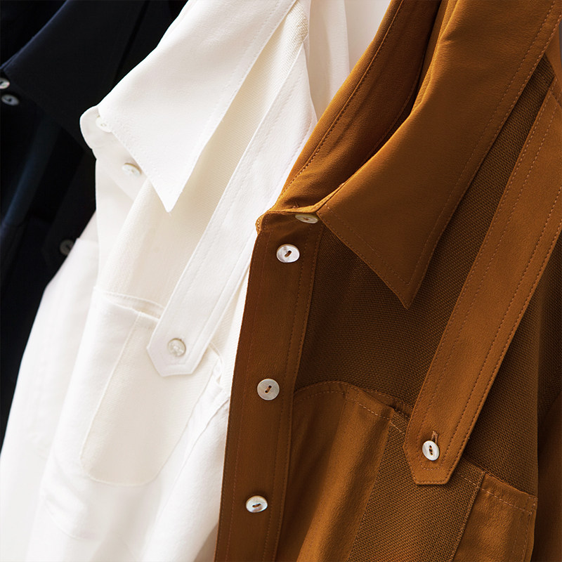 Are you wearing a baby-holding bag?NO Fashion Tooling Wind Shoulder Strap Design Fashion Two Genuine Silk Splicing Long Sleeves Shirt Q