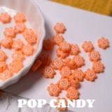 Поп -конфетные подсолнечные улыбки лица бусины