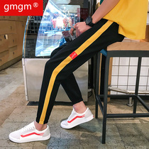  Spring and autumn tied feet mens casual sports slim-fitting nine-point pants youth Harun small feet striped pants Korean version of the trend