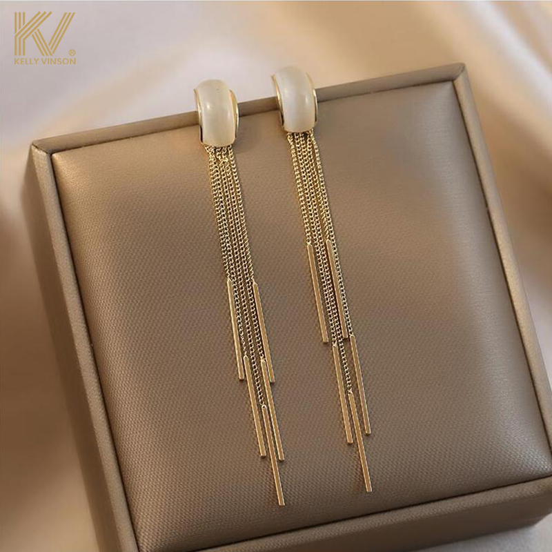 Cat Eye Stone Earl Decorated Pure Silver Needle Zircon Fairy Air Ear Needle Retro Superior Sensual Long version Temperament Su Gold Earrings Lady