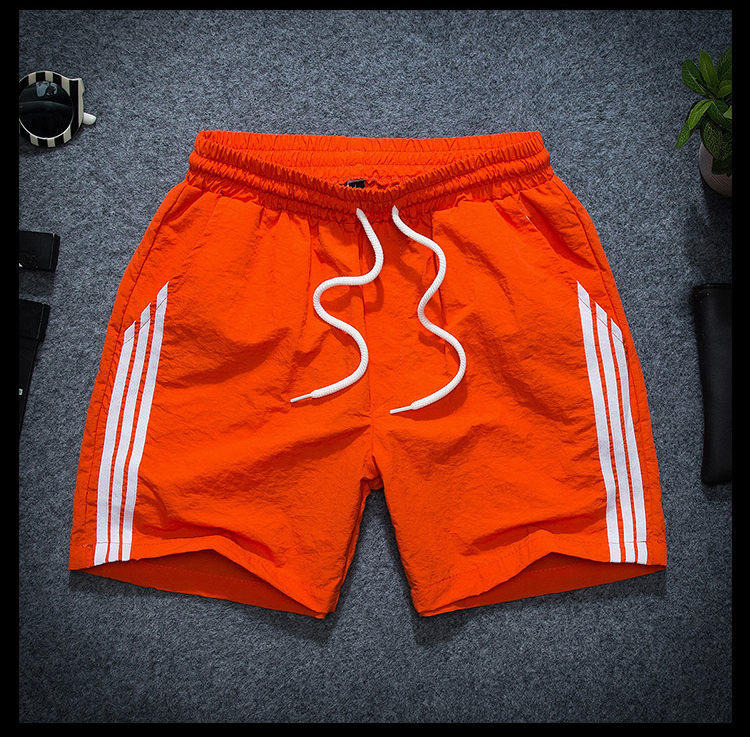 Ba thanh thể thao quần short nam chạy thể dục nhanh chóng làm khô ba quần đa năng thường bốn quần nam mùa hè 34 quần quần short nữ the thao