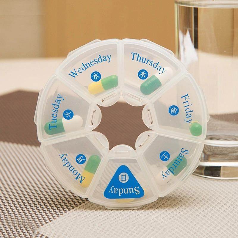 Japan's KM portable seven-grid medicine box to increase a week's 7-day medicine box seven-day multi-functional portable medicine storage box