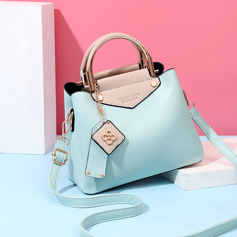 Korean version of pure color women's bag 2021 new tide 100 hitch upscale hand single shoulder diagonal satchel bucket bag soft leather Japanese