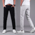 Quần âu nam màu đen Slim quần dài thẳng cơ thể nam eo trẻ trung trung niên Quần âu nam quần jeans nam Quần tây thường