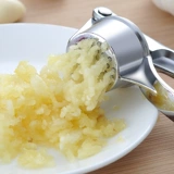 Домашний ручной насущный чесночный средний зажигание делает чесночный сжатие чесночной грязь, чесночный сладкий, чесночный многофункциональный кухонный инструмент