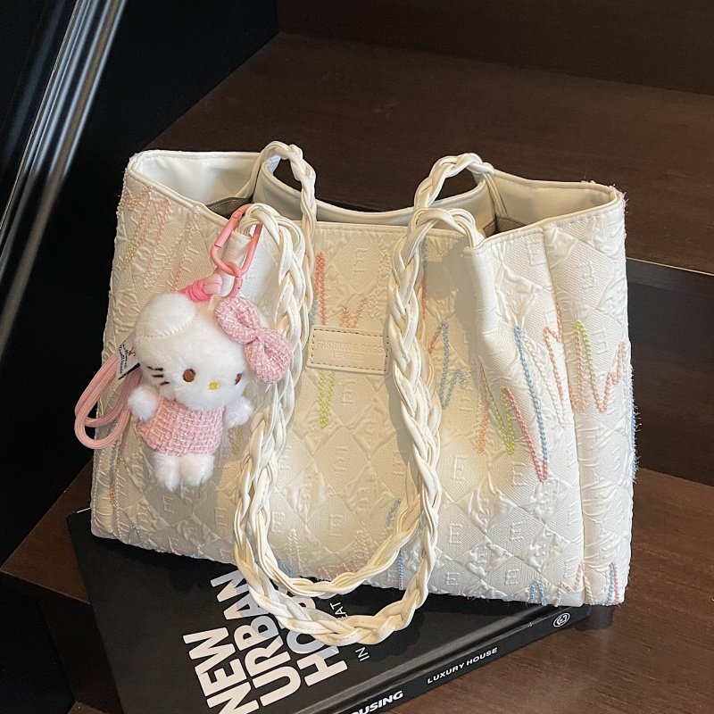 Высококачественная большая женская сумка на одно плечо, новинка 2025 года, модная универсальная сумка-тоут нишевого дизайна для пригородных поездок большой емкости.