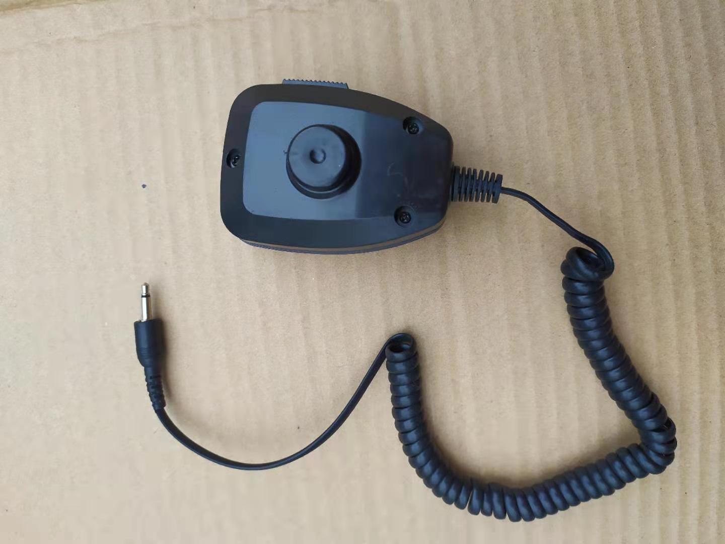 Hand-in-hand, a microphone for a speaker