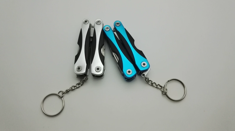 Mini đa chức năng kết hợp quà tặng ngoài trời di động đa mục đích kìm công cụ phổ key ring pocket công cụ kìm