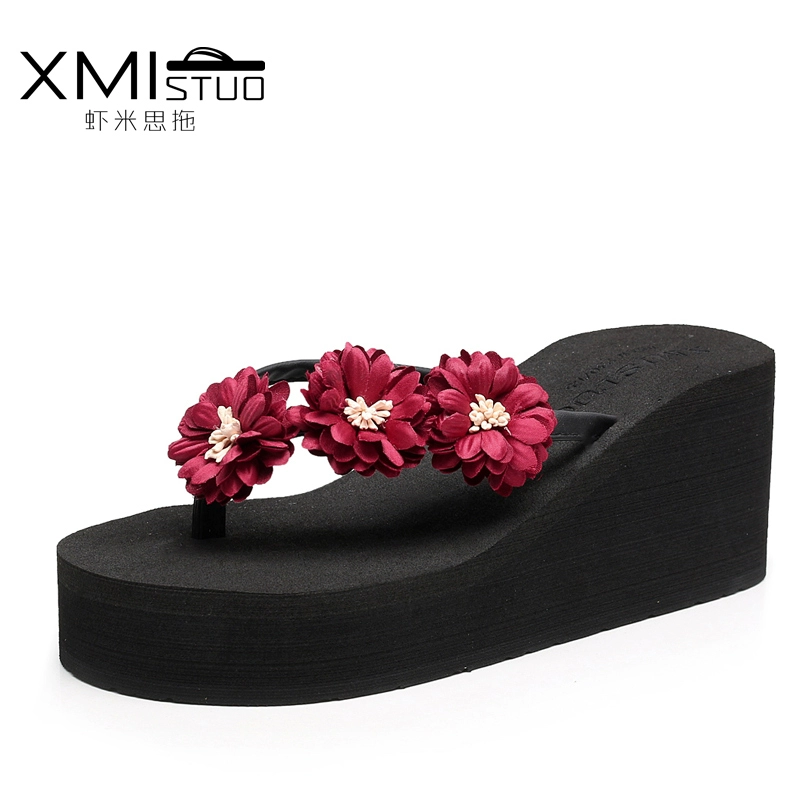 Dép đi trong nhà mùa hè nữ thời trang bãi biển mặc ngoài flip-flops hoa dày lớp vỏ bánh nướng xốp với dép lật chống sạt lở cao gót 