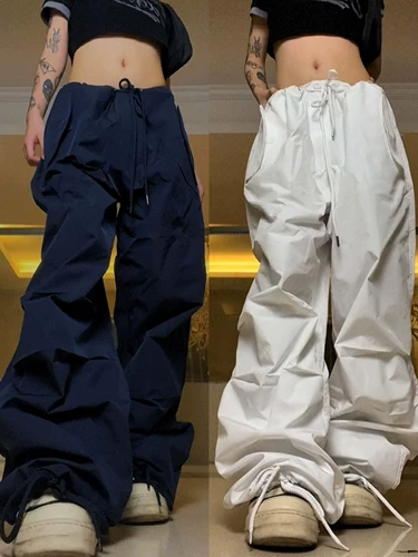 Гу -Чао Улица Флип -карман датчик дизайна талии рисунок веревочный работник Брюки мужчины и женщины могут сложить ногу, чтобы сложить чувство повседневных брюк