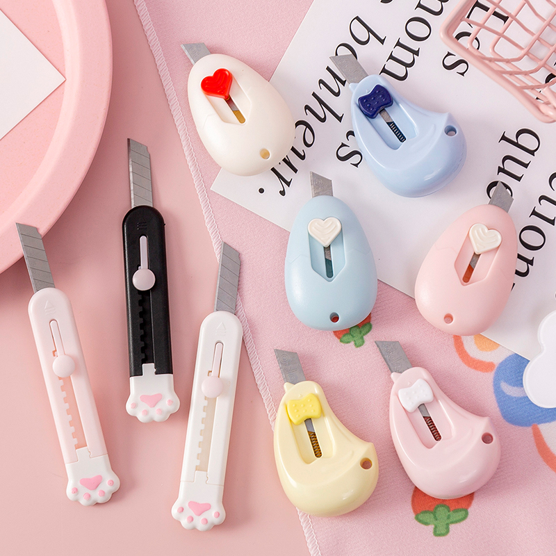 Art knife mini small cute cartoon paper cutter disassembly courier knife box opener student with poop hand in hand with the knife
