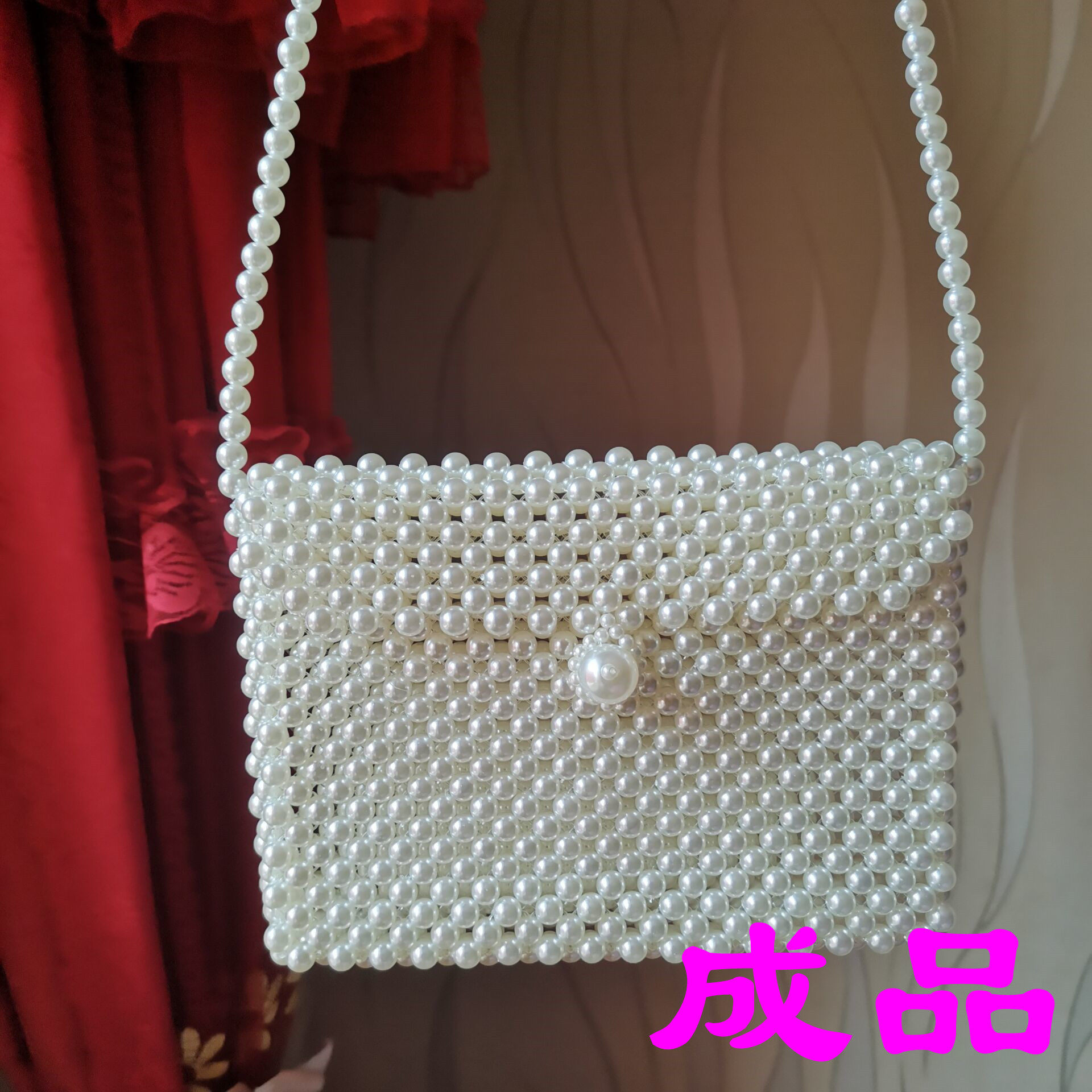 Finished product imitation pearl handbag mobile phone change female sling and net red knitting package to girls 2022