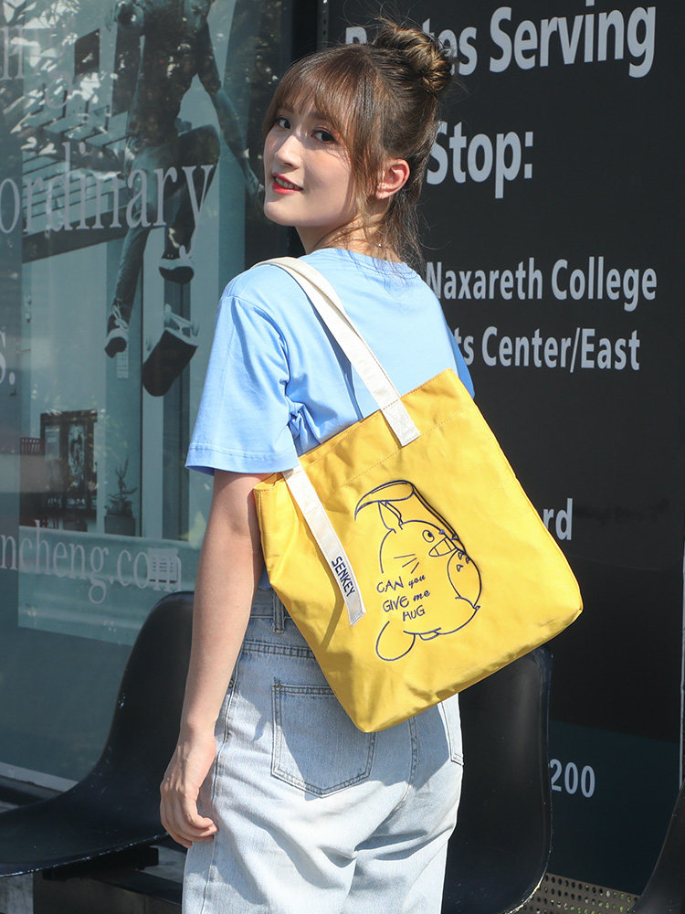 Sails Cloth Bag Women's Oblique Satchel System Brief large capacity class The new dragon cat college students hand single shoulder bag small crowdsourced