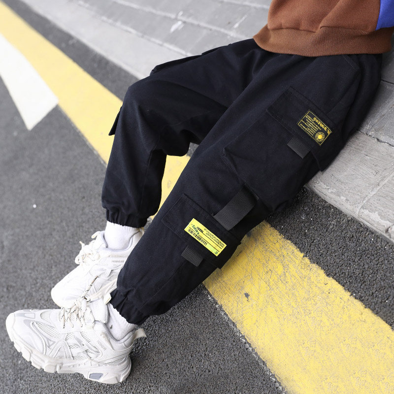 Korean boys autumn black overalls 2022 spring and autumn new children's pants Western style big kids fashionable trousers