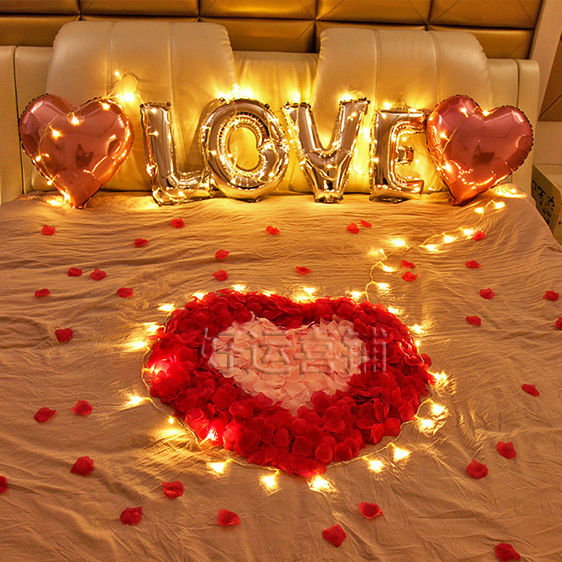 Boyfriend and girlfriend make romantic surprise confession proposal Rose petals Hotel bed room balloon decoration Valentine's Day