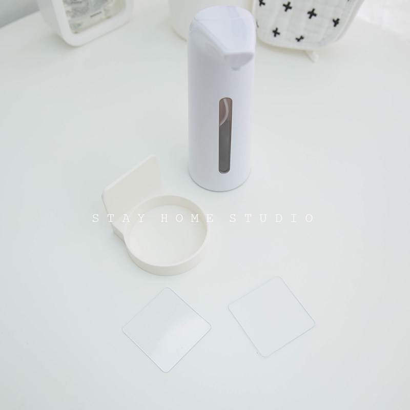 Stay home seamless non-perforated adhesive wall-mounted circular bottle holder induction soap dispenser plastic hanger