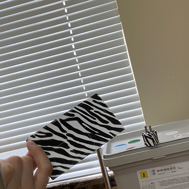 Again A and a black and white zebra pattern charger sticker is suitable for iPhone8 X 11Pro power patch decoration