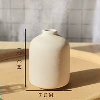 Маленькая керамическая бутылка белая