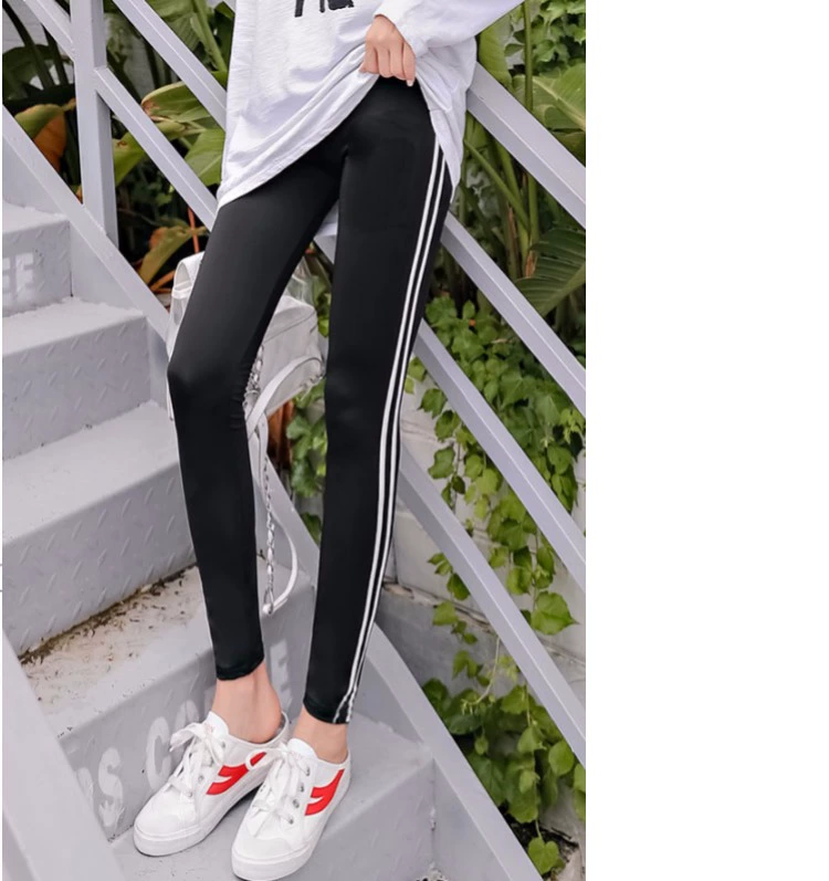 Mùa thu thể thao sọc dọc modal cotton xà cạp nữ bên thanh sọc trắng mặc eo cao chín điểm quần kích thước lớn
