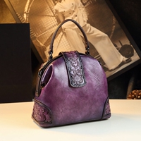 Retro embossed dumpling bag women's cross-body genuine leather women's bag 2025 new niche middle-aged women's portable shoulder bag women