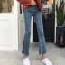 Quần lửng gió lộng lẫy Hồng Kông chân tóc không đều quần micro-bell nữ hoang dã eo cao rắn rỏi chín quần jeans thủy triều quần jean nữ 2021 Quần jean