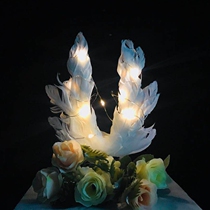 Birthday cake decoration white big feather wings glowing angel wings beautiful creative cake decoration