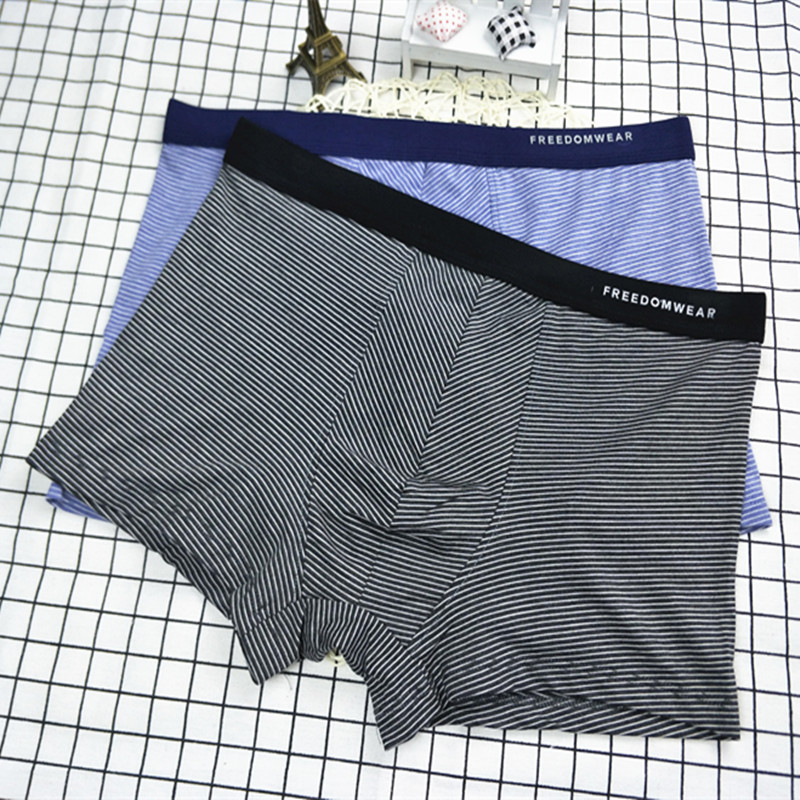 Đồ lót nam cotton boxer nam thanh niên cotton thủy triều bốn góc quần short 衩 sợi nam màu cotton cộng với phân bón XL quần lót nam