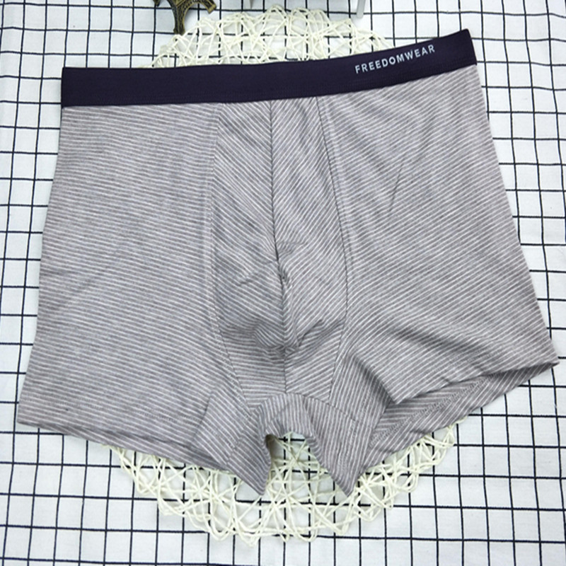 Đồ lót nam cotton boxer nam thanh niên cotton thủy triều bốn góc quần short 衩 sợi nam màu cotton cộng với phân bón XL quần lót nam