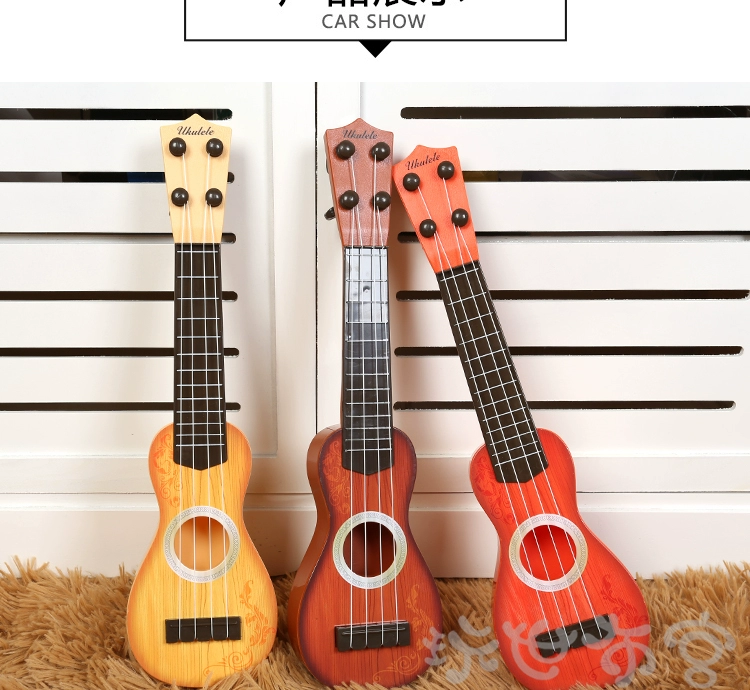 Trẻ em của mô phỏng mini ukulele có thể chơi nhạc cụ đàn piano bé âm nhạc nhỏ guitar nhựa guitar đồ chơi