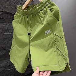 Summer New Trendy Brand Solid Color Quick-Drying Casual Shorts for Men, Fashionable Loose Versatile Laser Perforated Breathable Five-Point Shorts