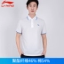Li Ning ngắn tay nam nữ Áo sơ mi mùa hè nhóm mua đôi mẫu thể thao thoáng khí thấm mồ hôi rắn màu áo thun giản dị Áo polo thể thao