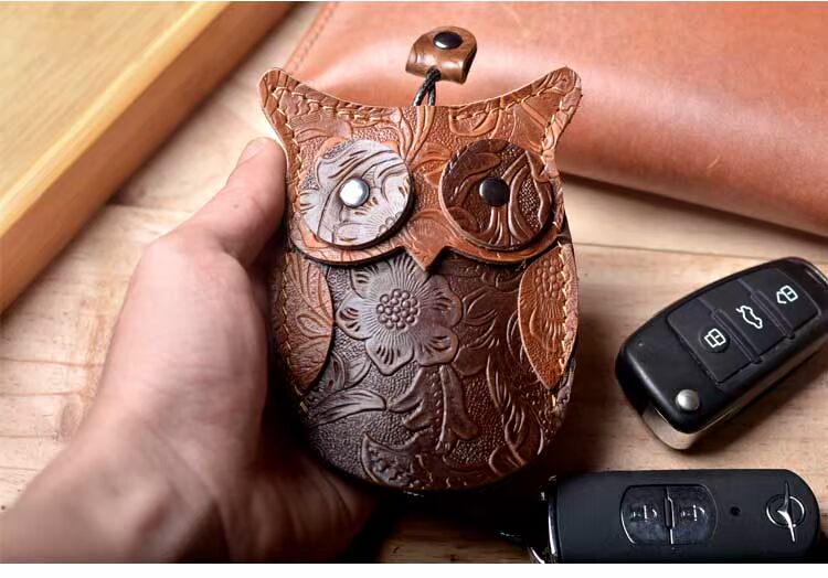 Handmade da bò chìa khóa xe da Trường hợp đầu tiên da bò phổ quát bộ chìa khóa xe nam và nữ cá tính sáng tạo túi đựng chìa khóa xe máy