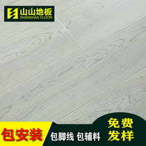 Mountain reinforced composite wood floor factory direct sales home wear-resistant non-slip 12mm package installation and delivery skirting line