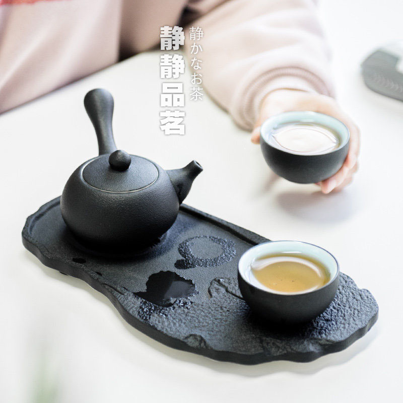 British green side between ink pot of Japanese kung fu tea set ceramic teapot set with a pot of tea tray two cups