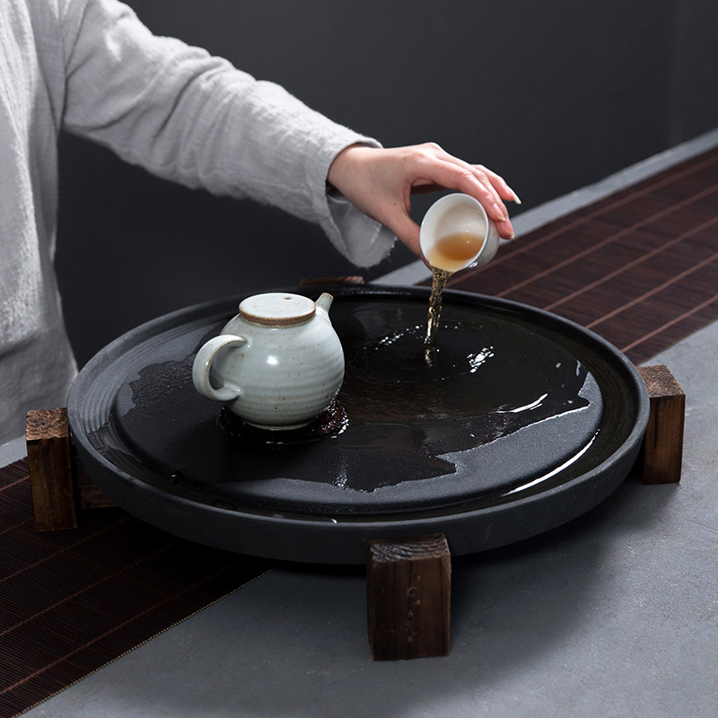 Stone mill large coarse pottery tea tray ceramic tea sets of kung fu tea set tea sea circular drainage water bearing solid wood tea base