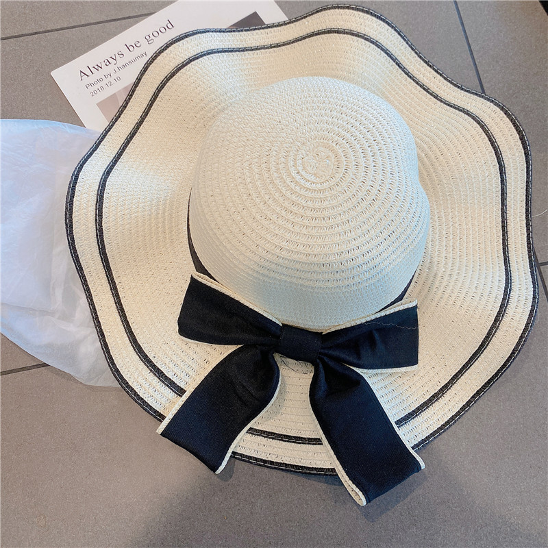 Women's Simple Style Bow Knot Big Eaves Straw Hat display picture 11